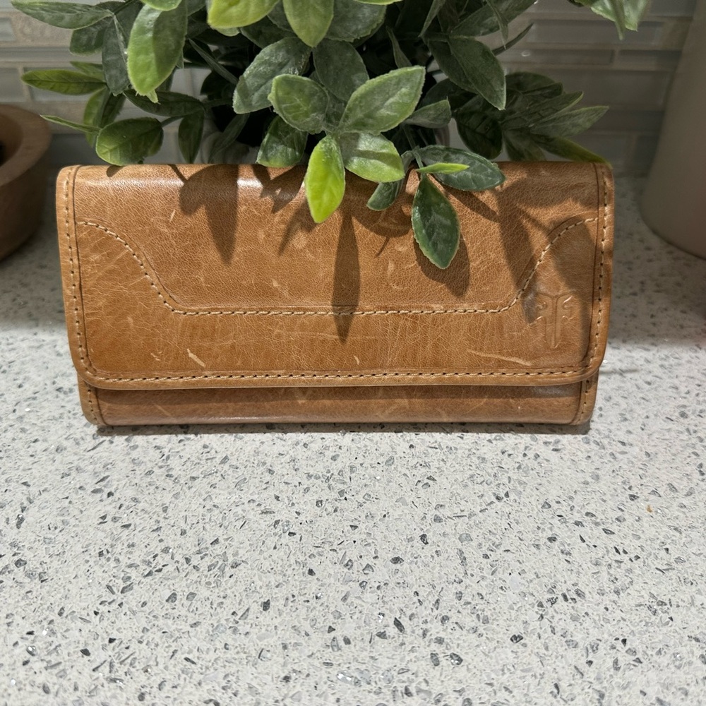 Leather Frye beige wallet. Smoke free home, excellent condition.